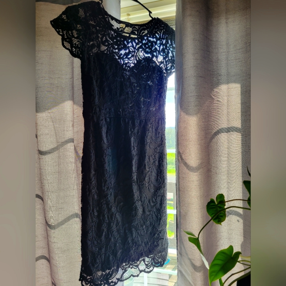 Lace covered black dress